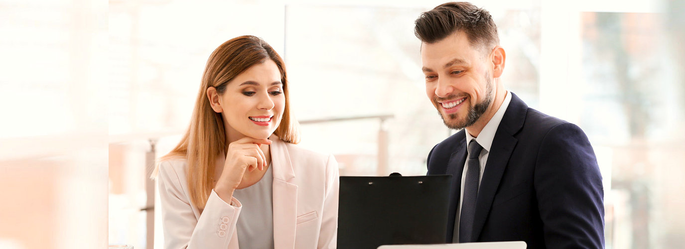 two people smiling